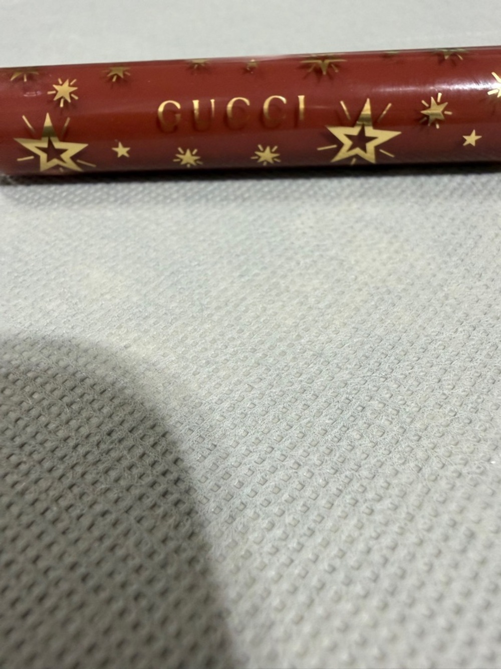 Gucci Red Lip Gloss with Gold Star Accents
